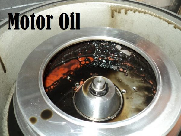 Centrifuge with motor oil label